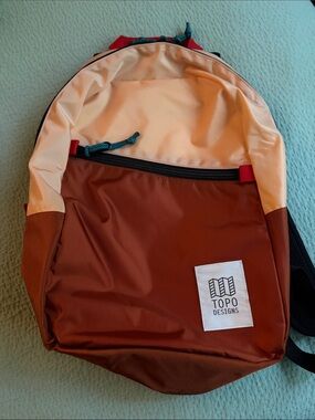 Topo Designs x Madewell light pack in pink and rust